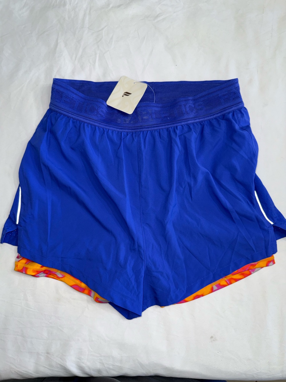 Fabletics Royal Blue Athletic Shorts with Orange Accent